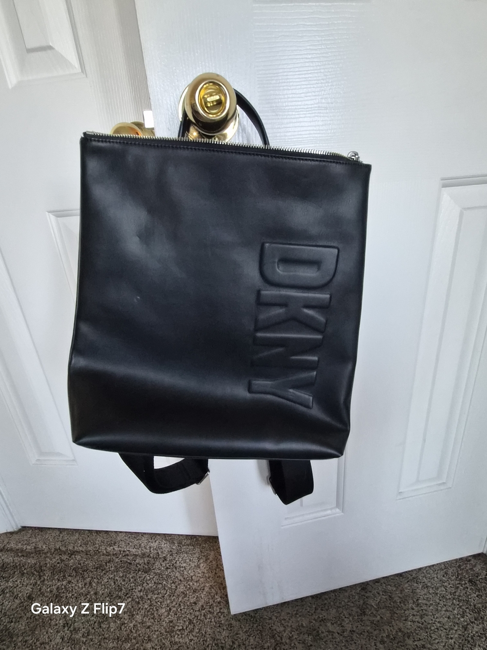 DKNY Black Embossed Logo Leather Backpack
